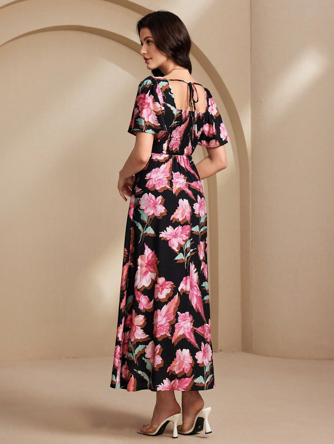 Title: Look effortlessly chic in our Elegant Floral Print Dress! This stylish fashion statement features a stunning floral print that is sure to turn heads. Made with high-quality fabric, it offers comfort and style. Perfect for any occasion, this dress is a must-have for any stylish woman's wardrobe.