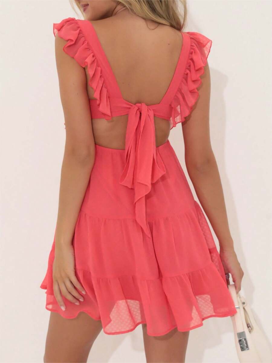 Flaunt your style in this playful Chic Ruffle Strap Mini Dress. With its unique ruffle straps and square neckline, this sleeveless dress is perfect for summer. Available in a variety of solid colors, it's a must-have for any fashion-forward wardrobe. (And yes, it's as cute as it sounds!)