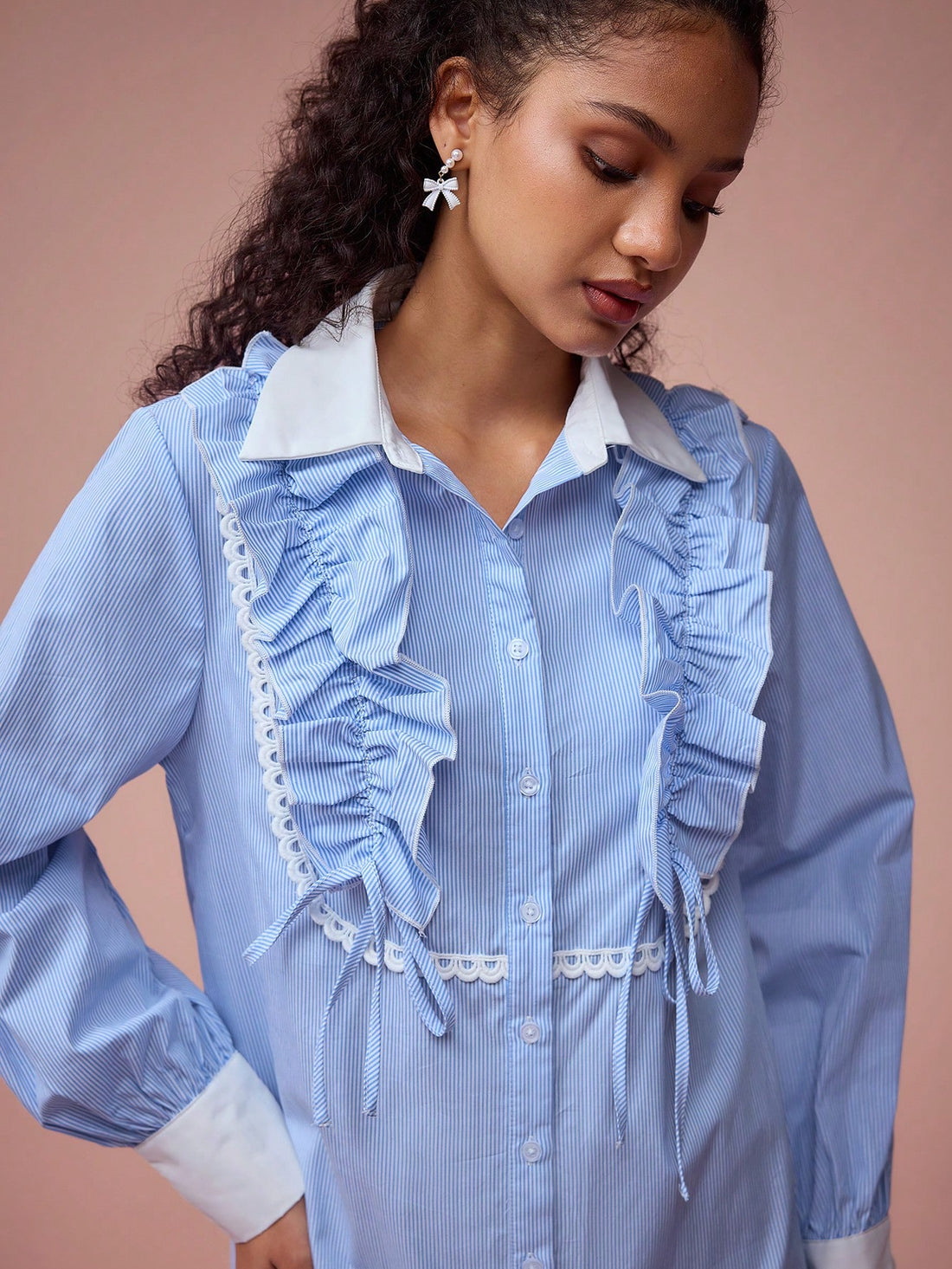 Elevate your spring and summer style with our Charming Striped Lotus Leaf Collar Dress. This playful and flirty dress features a delicate lotus leaf collar and a classic striped pattern, making it the perfect choice for romantic outings. Step out in style and turn heads with this must-have dress.