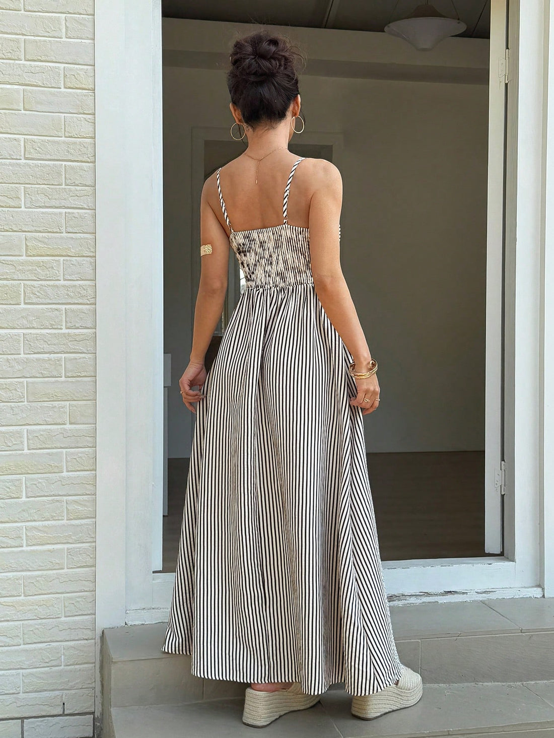 Effortlessly rock the summer with this Casual Striped Spaghetti Strap Maxi Dress. With its playful stripes and comfortable spaghetti straps, this dress is perfect for any casual occasion. Never sacrifice style for comfort again with this must-have piece for your summer wardrobe.