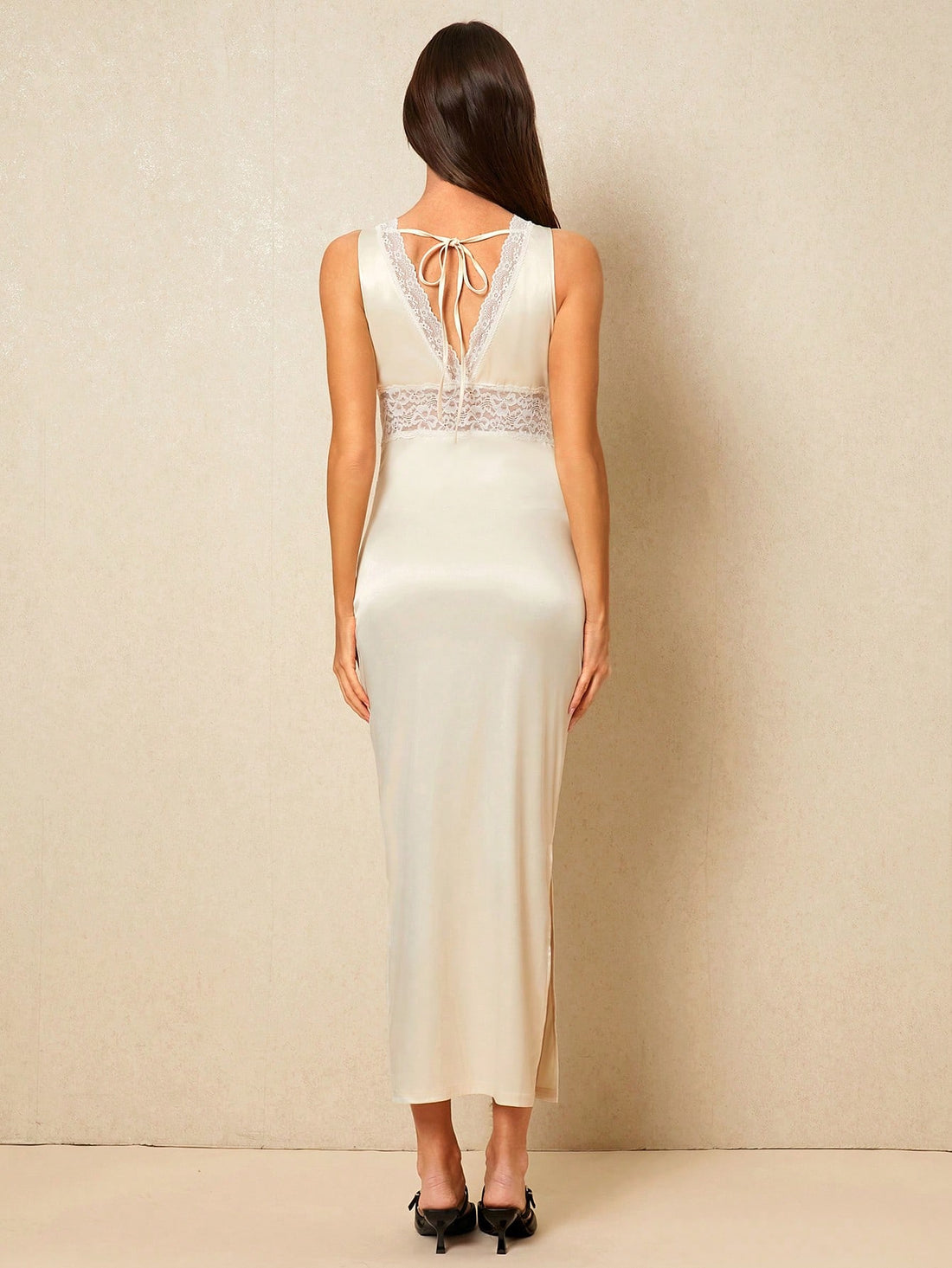 Dress to impress with our Champagne Elegance dress, featuring delicate French lace and a flattering v-neckline. Perfect for a timeless and stylish spring look, this midi dress is sure to turn heads. Elevate your wardrobe with our beautiful and elegant design. Cheers to spring fashion!