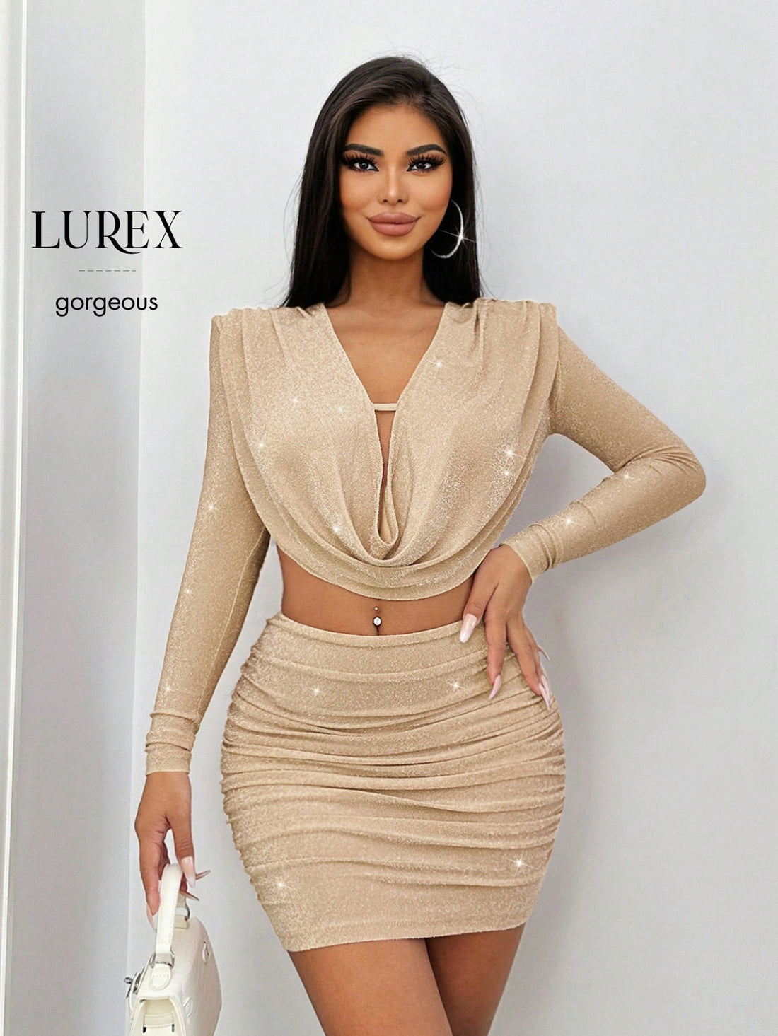 Elevate your fall wardrobe with this show-stopping two-piece set! The cropped top features a charming ruffle collar and long sleeves for that effortless autumn elegance, while the pleated bodycon mini skirt hugs your curves in all the right ways. Perfect for date nights, brunch with friends, or whenever you want to turn heads. Mix, match, or wear together—this versatile set is your new go-to for looking polished and put-together.