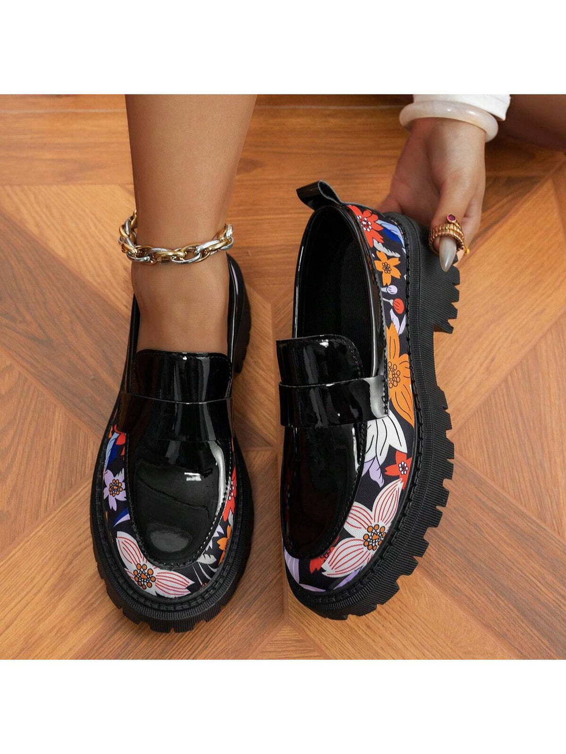 Add a touch of whimsy to your summer style with these chic floral loafers. Designed with a versatile Mary Jane style, these platform shoes effortlessly elevate any outfit. Slip into effortless elegance and stand out in a sea of basic footwear.