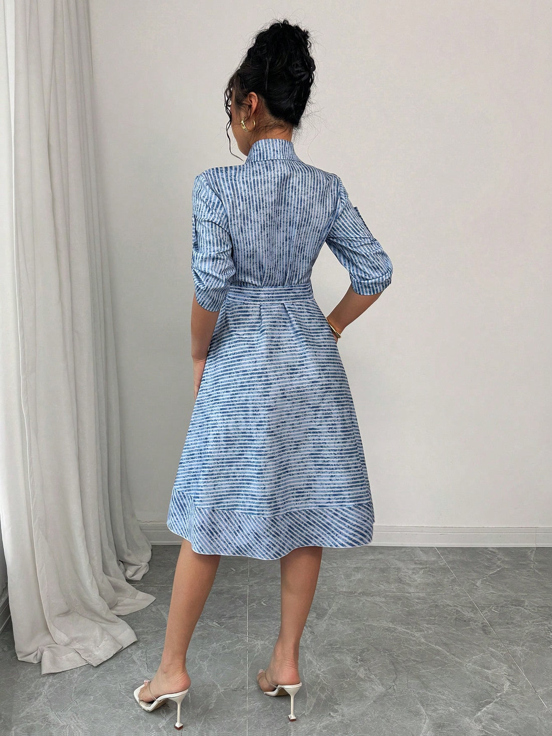 Strut your stuff in this playful denim-effect dress that's all about the details! The eye-catching stripes and contrast elements create a fun visual pop, while the belted waist cinches perfectly to flatter your figure. With breezy short sleeves, this dress strikes the perfect balance between casual cool and put-together elegance – perfect for turning heads at your next brunch date or weekend outing!