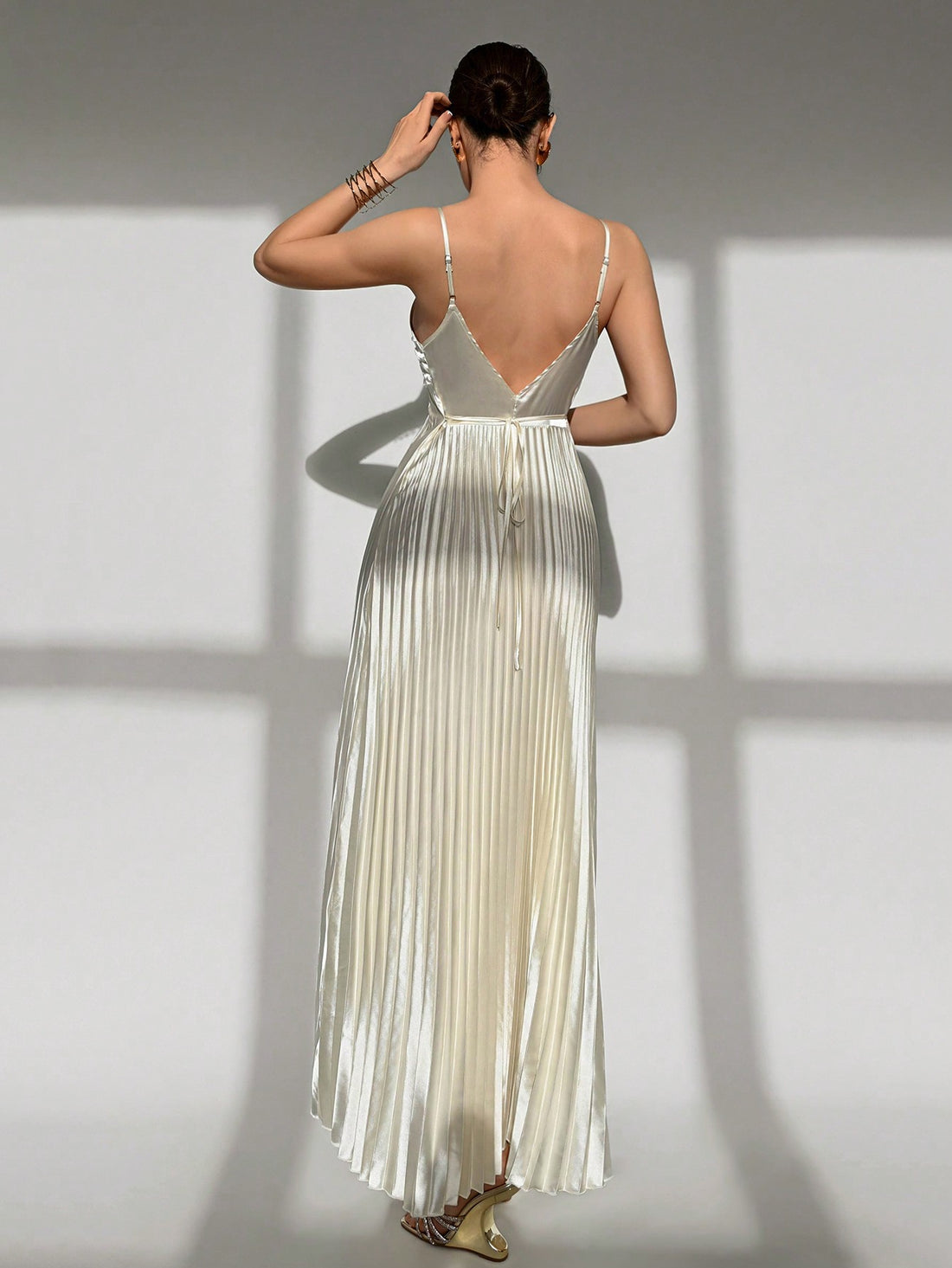 Step into the spotlight with this Elegant Apricot Pleated Long Strap Dress, perfect for weddings and bridesmaid parties. Its flowing pleats add a touch of whimsy, while the soft apricot hue keeps things sweet and stylish. The long straps provide a graceful silhouette that moves effortlessly with you—get ready to twirl, dance, and make unforgettable memories in this charming dress!