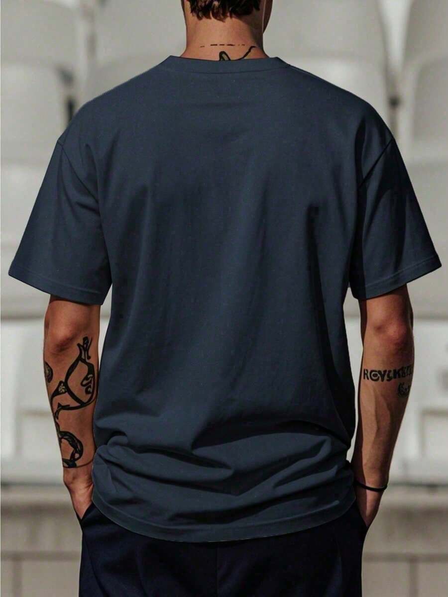 Step out in style with these Trendy Men's Vintage Graphic Tees! Made from bold, comfortable cotton, they bring back the iconic Y2K streetwear vibe. Perfect for mixing nostalgia with modern attitude, these tees add a playful edge to any outfit. Whether you're hitting the city streets or hanging with friends, these shirts keep your look fresh and effortlessly cool.