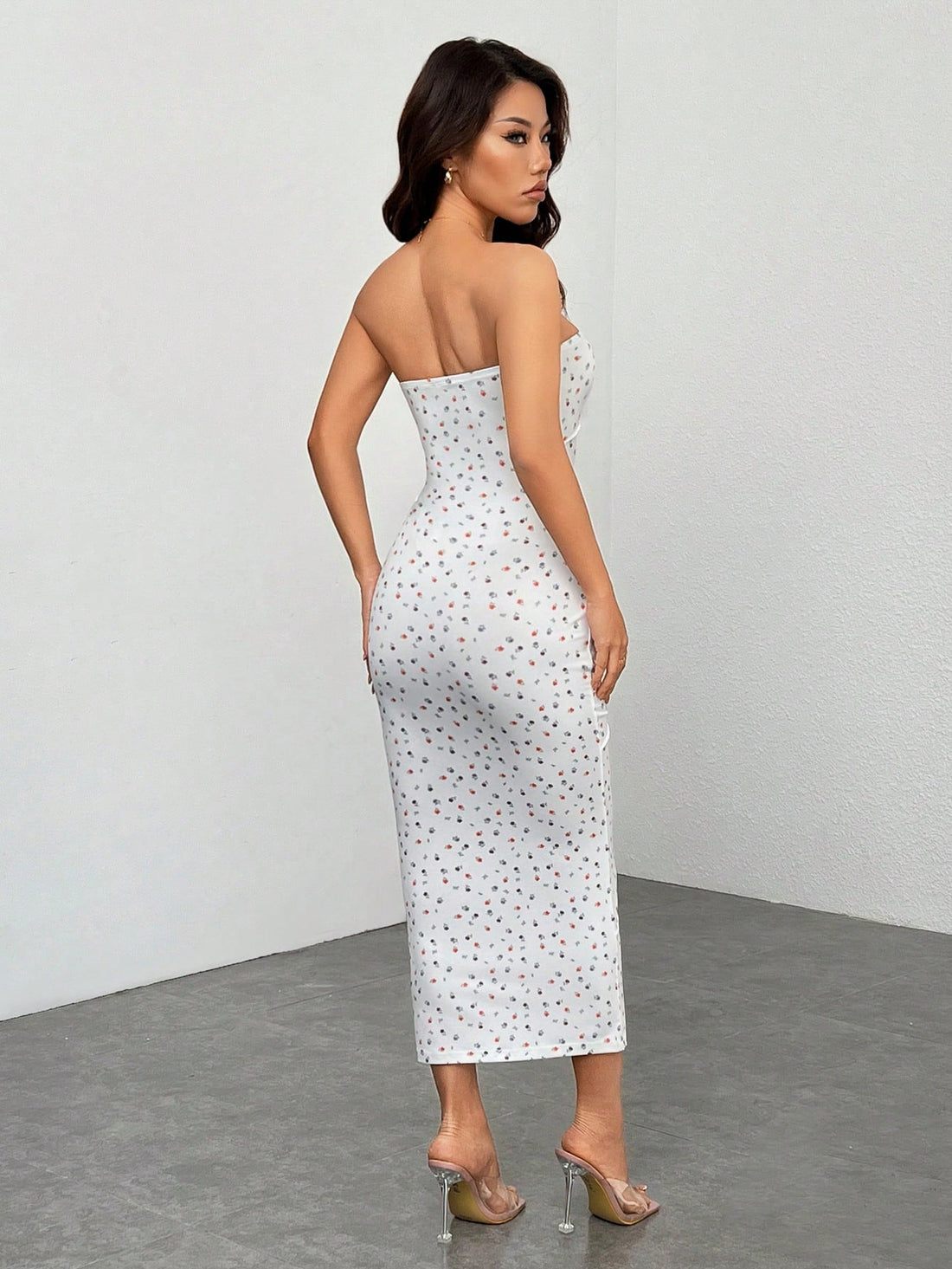 Dress to impress this summer with our Chic Summer Petal Mini Dress! This trendy pink floral tube top will make you stand out at any event, while keeping you cool and comfortable. Perfect for a fun and playful look. (Don't forget your shades!)