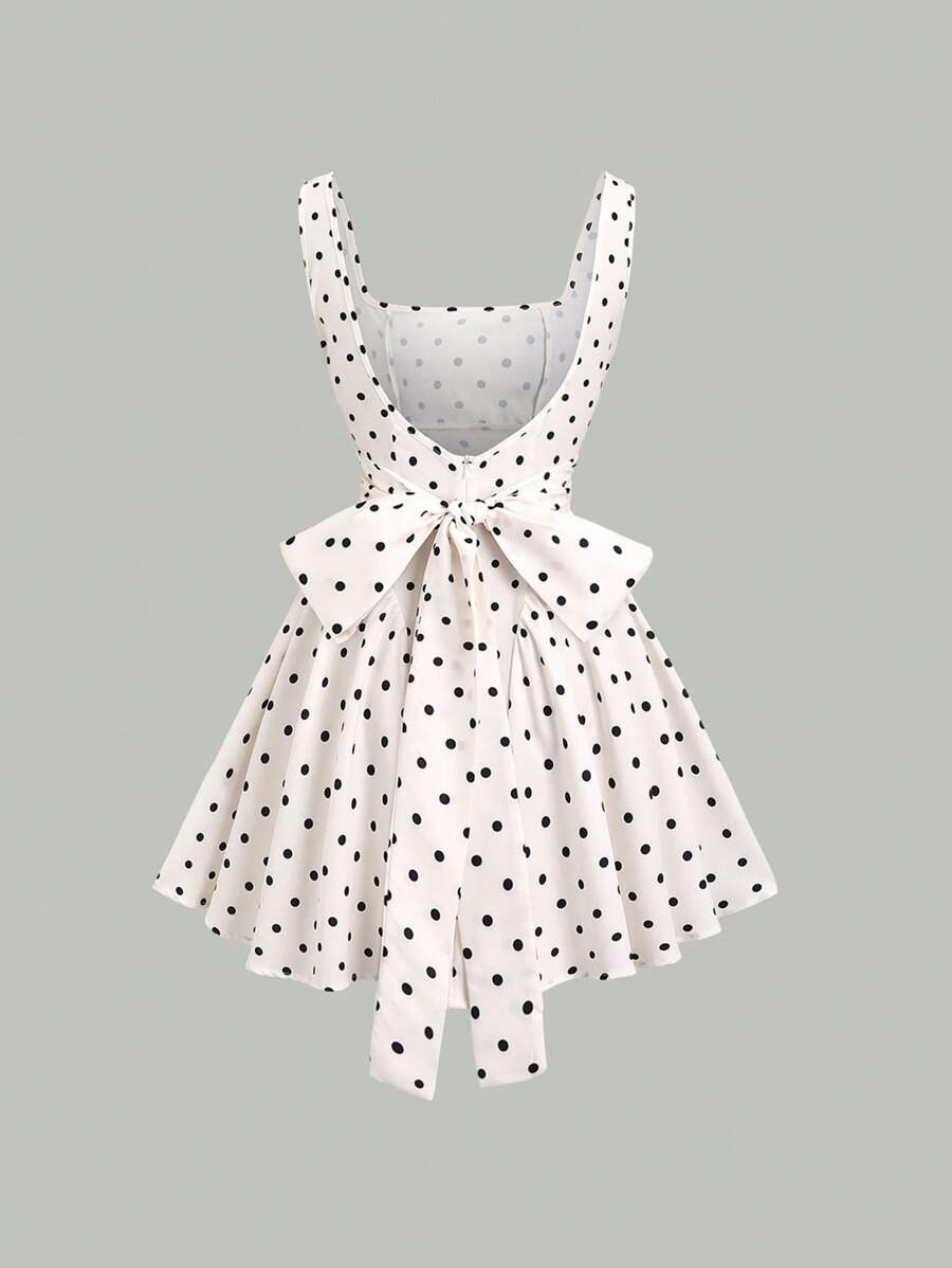 Step out in style with this Chic Retro Polka Dot Mini Dress, featuring a flattering V-neck and a playful back cutout that adds a flirty twist. Its timeless polka dot pattern brings classic American flair to your wardrobe, perfect for sunny days or lively nights. Lightweight and fun, this dress effortlessly combines vintage charm with modern sass.