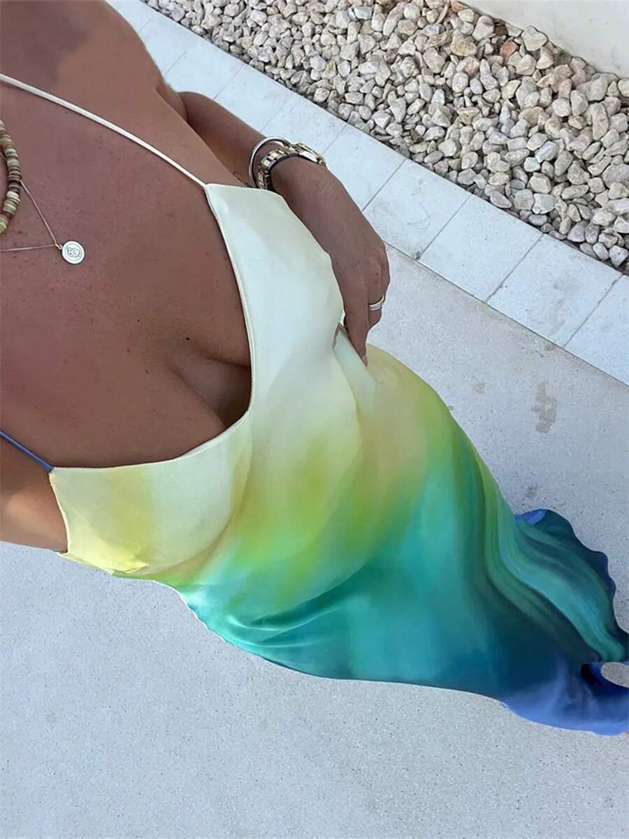 Get ready to slay at the beach parties with our Chic Gradient Summer Cami Dress! This V-neck, backless dress is effortlessly stylish and will make you stand out in any crowd. Perfect for a day of fun in the sun, this dress will keep you cool and chic all day long.