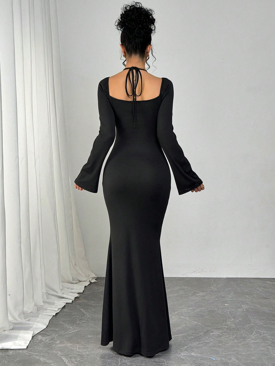 Be the belle of the ball in this elegant lace dress! The crisscross halter neck adds a touch of romance to any occasion. Showcase your curves in this fitted party dress, perfect for those special moments.