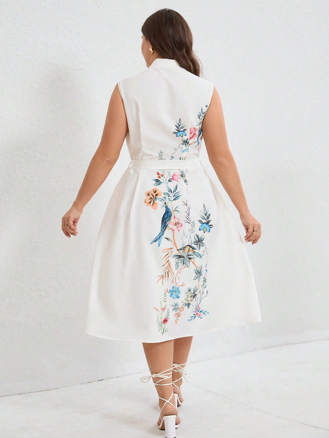 Effortlessly chic, this French-inspired midi dress will be your go-to for any vacation outfit. The sleeveless V-neck top accentuates the defined waist, while the side slit adds a touch of sophistication. Perfect for strolling along the beach or exploring city streets. Ooh la la!