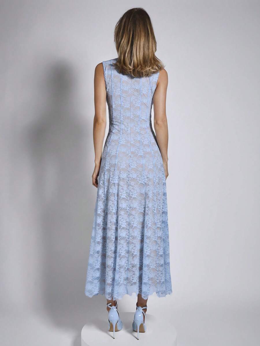 Step into the spotlight with this elegant blue lace dress! Its sleeveless design and mid-length cut keep you cool and stylish for spring and summer graduations. Delicate lace detailing adds a touch of charm, making it perfect for celebrating milestones with a splash of fun and sophistication.