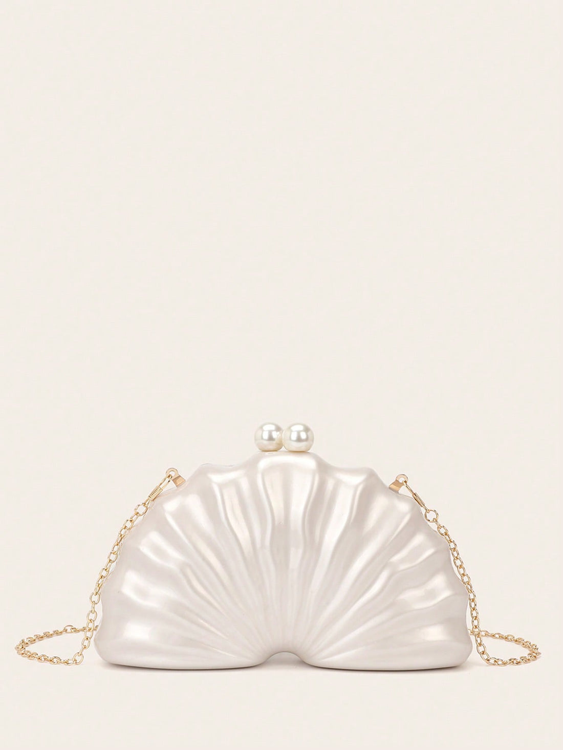 Make a splash at every celebration with this Elegant Shell-Shaped Acrylic Evening Clutch! Its unique shell design brings a touch of whimsy, while the detachable chain lets you switch between hands-free convenience and chic clutch style. Perfect for weddings and parties, this standout accessory keeps your essentials close with playful sophistication. Dive into fun and functional fashion wherever you go!