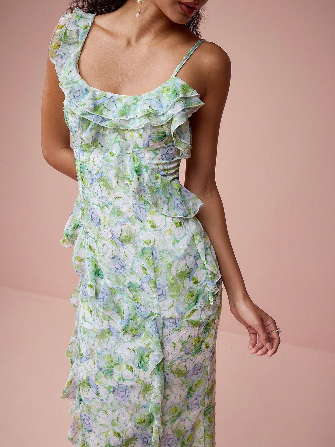 Make a stylish splash at your next event with our Dreamy Floral Mermaid Maxi Dress. The elegant ruffle suspenders add a touch of whimsy while the flowy fit flatters any figure. Perfect for spring and summer, this dress will bring a touch of floral elegance to your wardrobe.