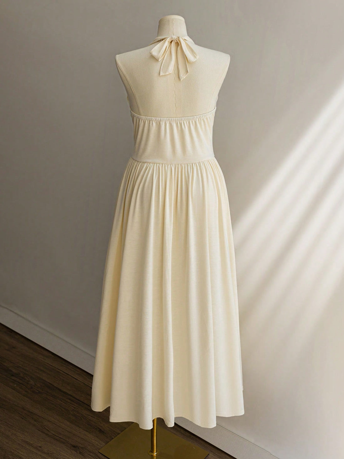 Step out in style with this Elegant Plus Size Halter Neck Long Dress, designed to turn heads wherever you go. Whether you're commuting, jet-setting on vacation, or celebrating at graduations, this dress blends comfort and flair effortlessly. The flattering halter neckline highlights your shoulders, while the flowing long design ensures you stay cool and confident all day long. Embrace playful elegance that fits just right and makes every occasion a little brighter.