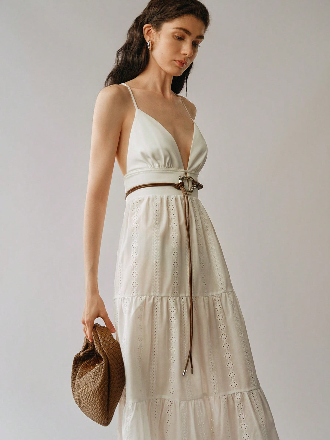 Slip into effortless vacation style with our Elegant Embroidered Spaghetti Strap Dress. Perfect for casual days lounging by the beach or exploring quaint streets, this dress features delicate embroidery and a comfortable spaghetti strap design. Relax in style and make a statement with this must-have addition to your vacation wardrobe!