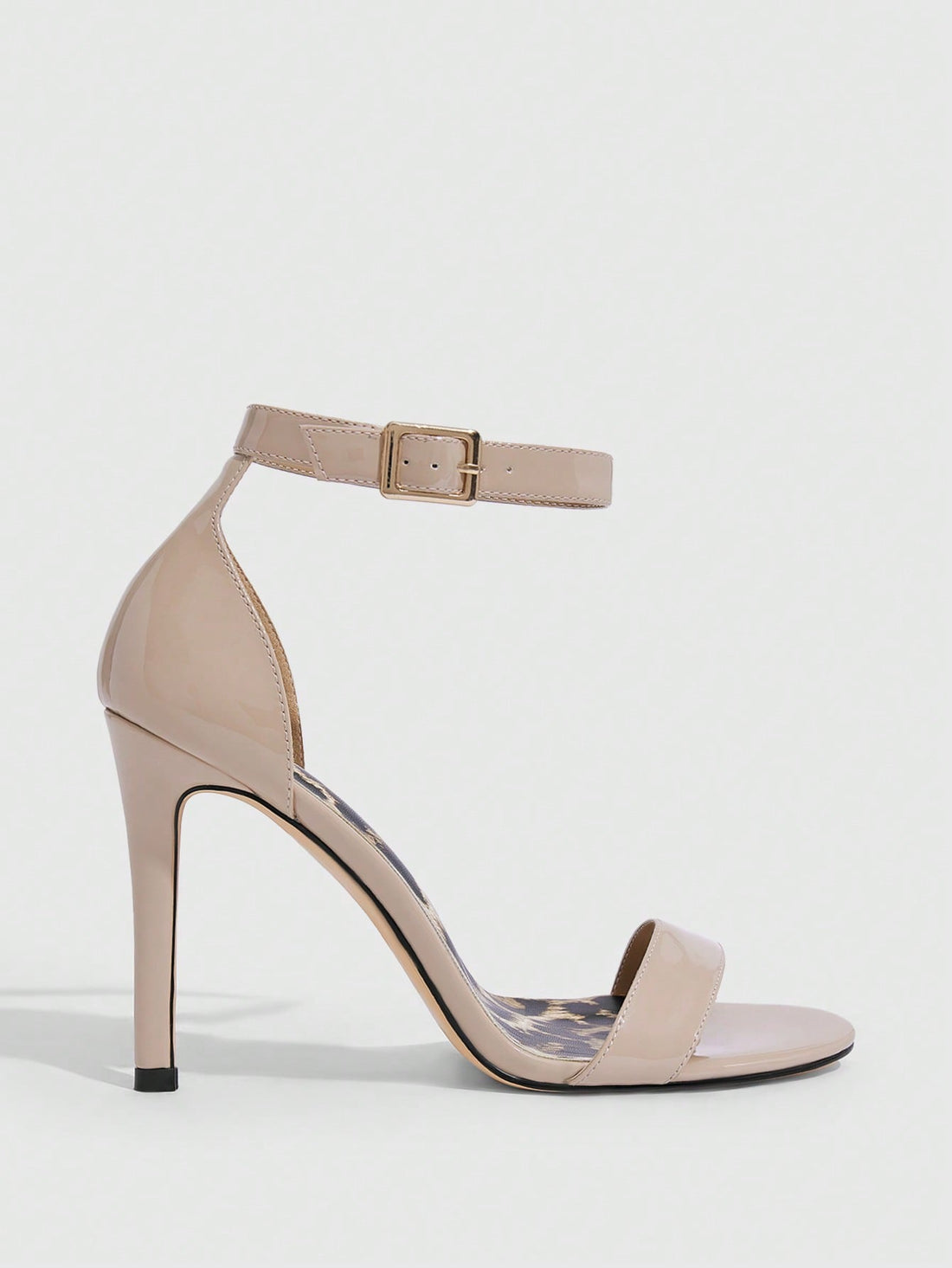 Unleash your wild side with these show-stopping leopard print high heel sandals! Featuring a sleek silhouette and adjustable buckle strap, they're the perfect blend of fierce and fabulous for any occasion. Whether you're heading to brunch, a night out, or just want to add some spotted sass to your everyday look, these heels deliver instant style points. The secure buckle keeps you comfortable all day long, while the bold leopard pattern ensures you'll turn heads wherever you go. Step into confidence and let