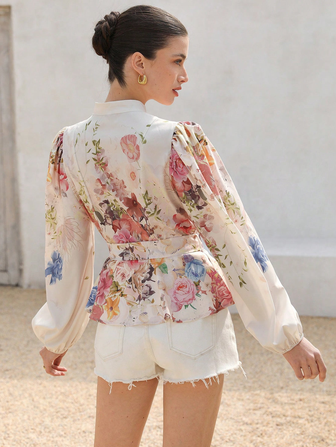 Embrace your elegant and romantic side with our Rosie Floral Stand-Up Collar Button-Down Shirt. Featuring a cinched waist for a flattering fit, this long sleeve shirt combines style and comfort. Perfect for adding a touch of charm to any outfit.