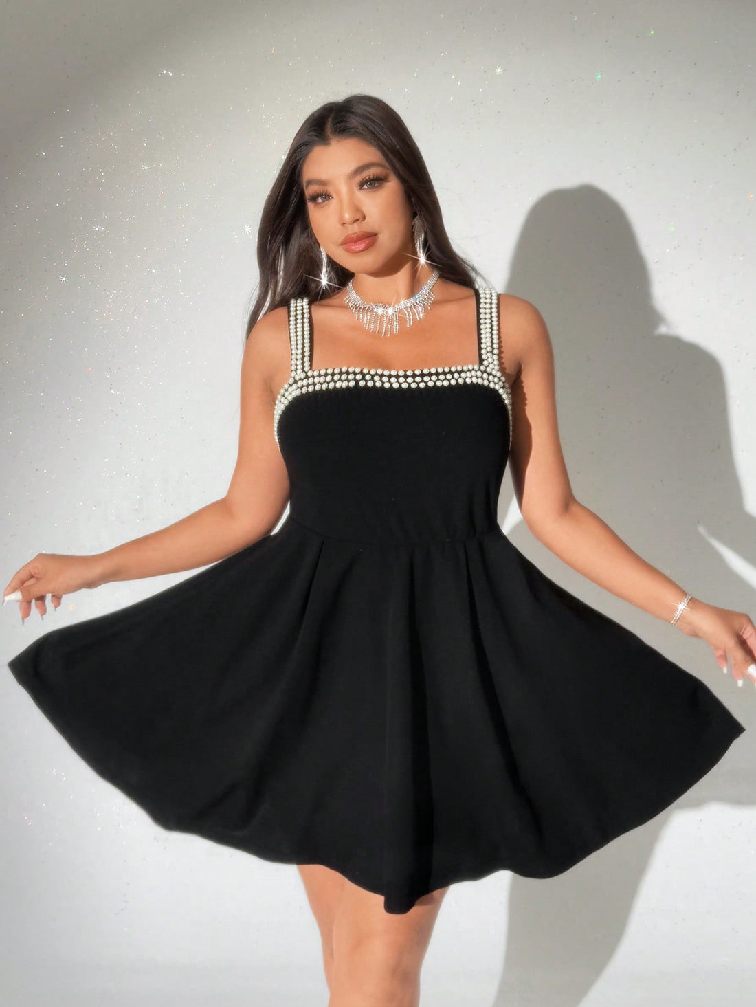 Turn heads with this plus size elegant knitted camisole dress, designed to hug your curves in all the right places. The studded waist adds a flirty sparkle, while the solid color keeps it sleek and sexy. Perfect for nights out or special occasions, this fitted dress combines comfort and style effortlessly. Feel confident, bold, and ready to shine!