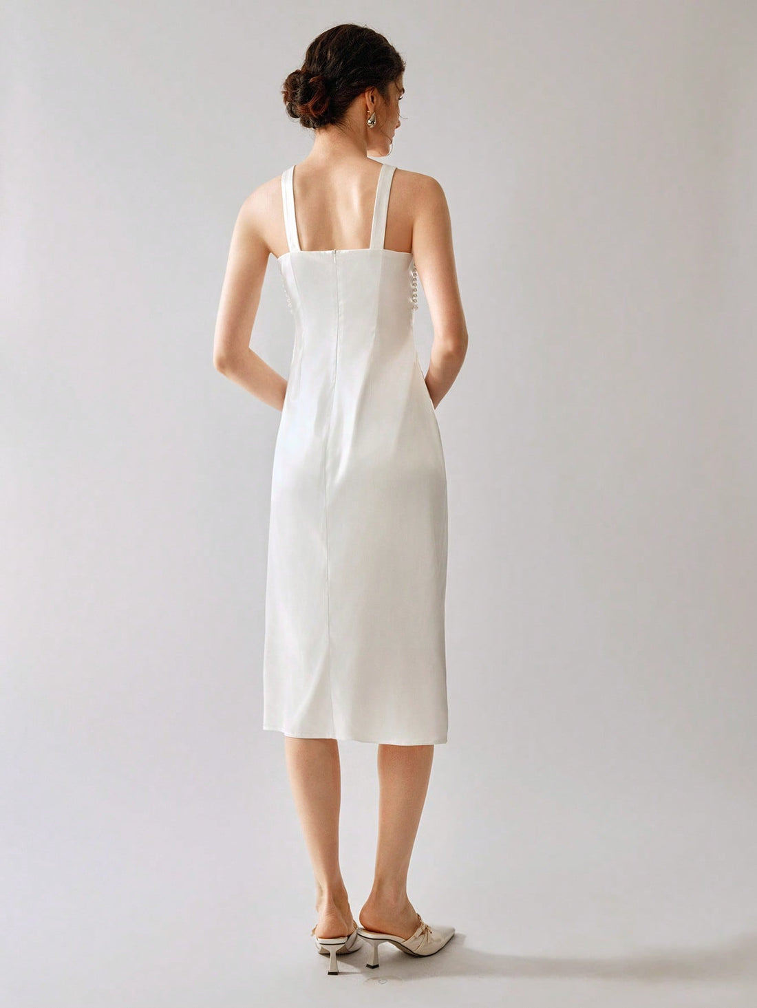 Feel elegant and playful in our Mid-Length Textured Bubble Bead Dress for Women. Perfect for any occasion, this dress will elevate your style with its unique bubble bead texture. Make a statement and stand out in this one-of-a-kind dress.