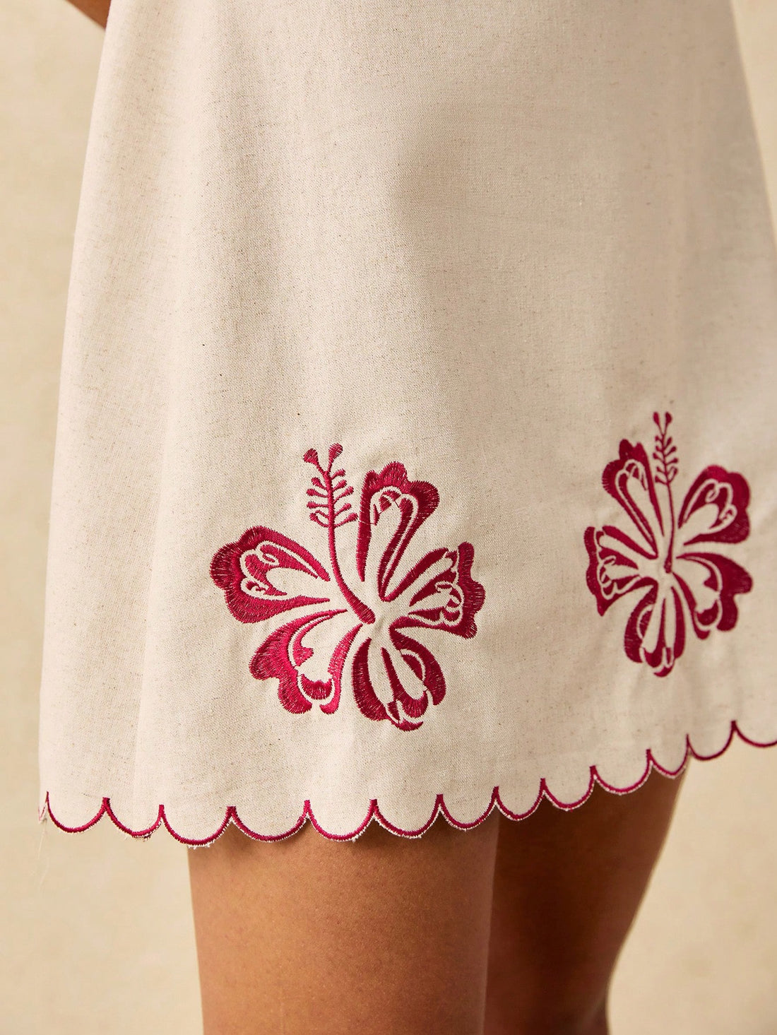 Say hello to the perfect dress for those sunny beach getaways! Our Floral Embroidered Minimalist Spaghetti Strap Short Dress is equal parts stylish and comfortable. With delicate floral embroidery and adjustable straps, you'll be turning heads while staying cool. Beach, please!