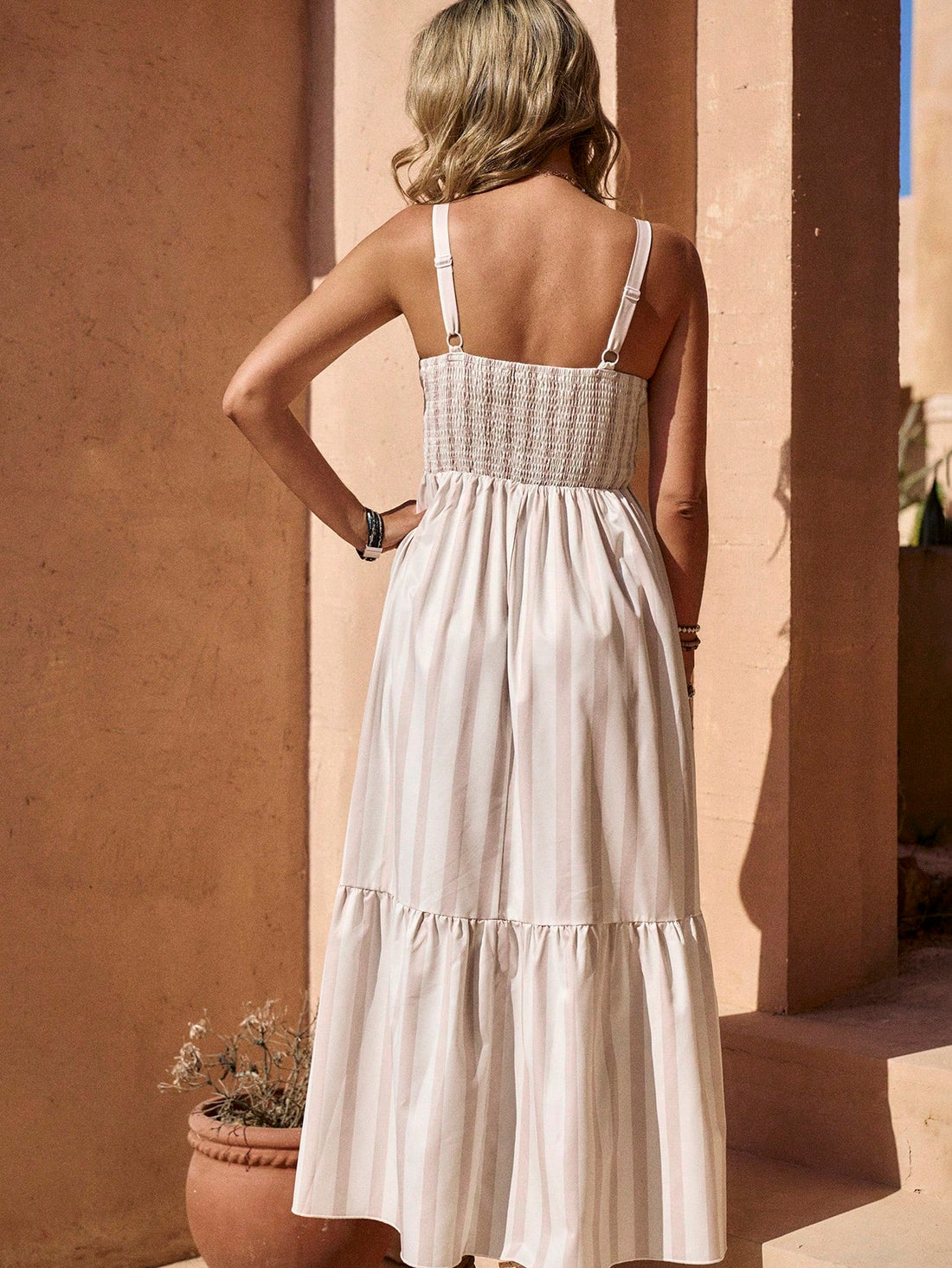 Get ready to turn heads in this playful Chic Summer Striped Ruffle Hem Dress! With adjustable spaghetti straps and a casual style, you'll stay cool and stylish all summer long. The ruffle hem adds a touch of fun and femininity to this must-have dress. Perfect for any occasion, from a day at the beach to a night out with friends.