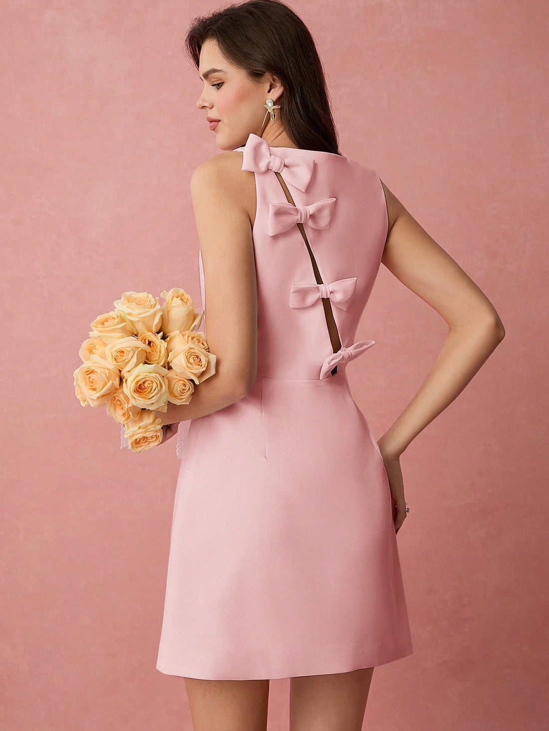 Get ready to sashay into spring and summer with this elegant sleeveless dress! Featuring a chic back bow detail, this dress is both stylish and playful. Perfect for any occasion, from picnics to parties, this dress will have you feeling your most confident and fabulous self!