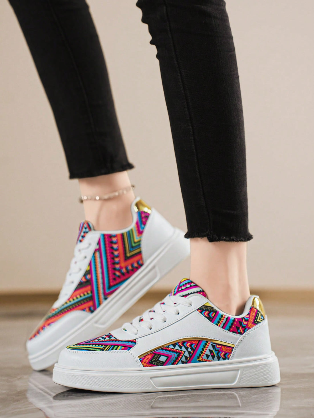 Step back in time with Retro Chic: Versatile Print & Color Block Platform Sneakers. These fashionable kicks offer effortless style with a fun twist. The platform design adds a playful touch while the versatile print and color block make it easy to pair with any outfit. Don't miss out on these retro gems!
