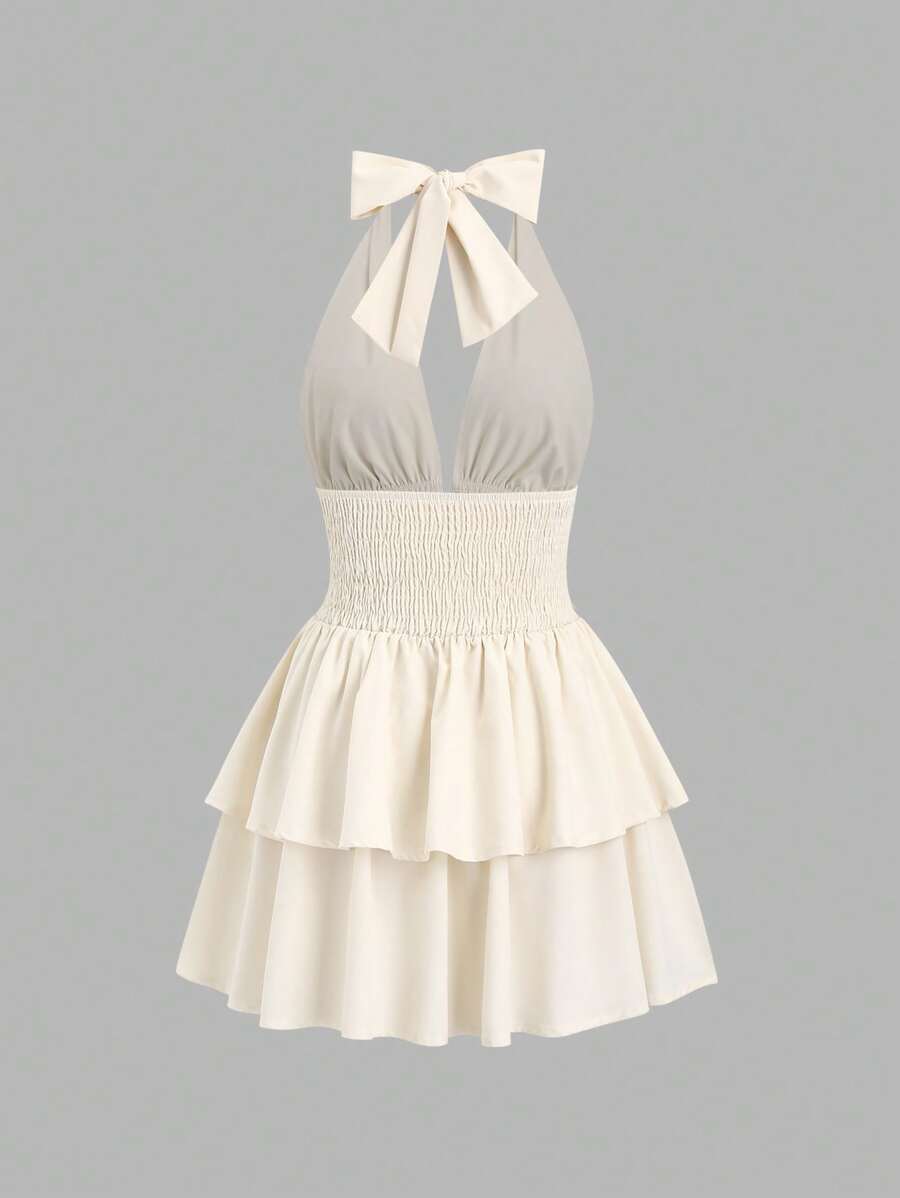 Step into the spotlight with this playful Y2K-inspired midi dress featuring a chic solid color and a flattering cinched waist. The open back and sling straps add a flirty touch, perfect for holiday parties or festive gatherings. Effortlessly stylish and comfortable, it’s your go-to dress for making memories and turning heads this Christmas season.