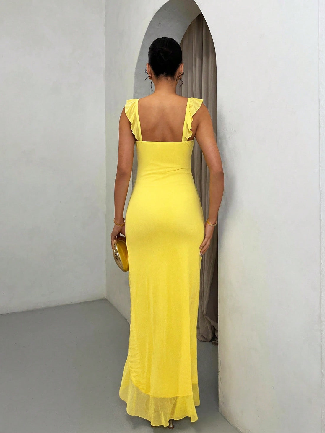 Unleash your inner fashionista with this chic yellow summer dress! The high-slit and ruffle hem add a playful touch, perfect for your next vacation outfit. Enjoy the lightweight and sleeveless design for ultimate comfort and style. #VacayVibes