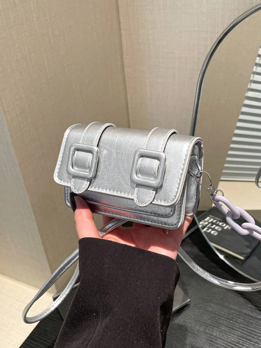 Lifestyle angle of mini preppy crossbody bag with colorful finish