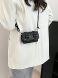 Front style view of mini bag in khaki tone with structured shape