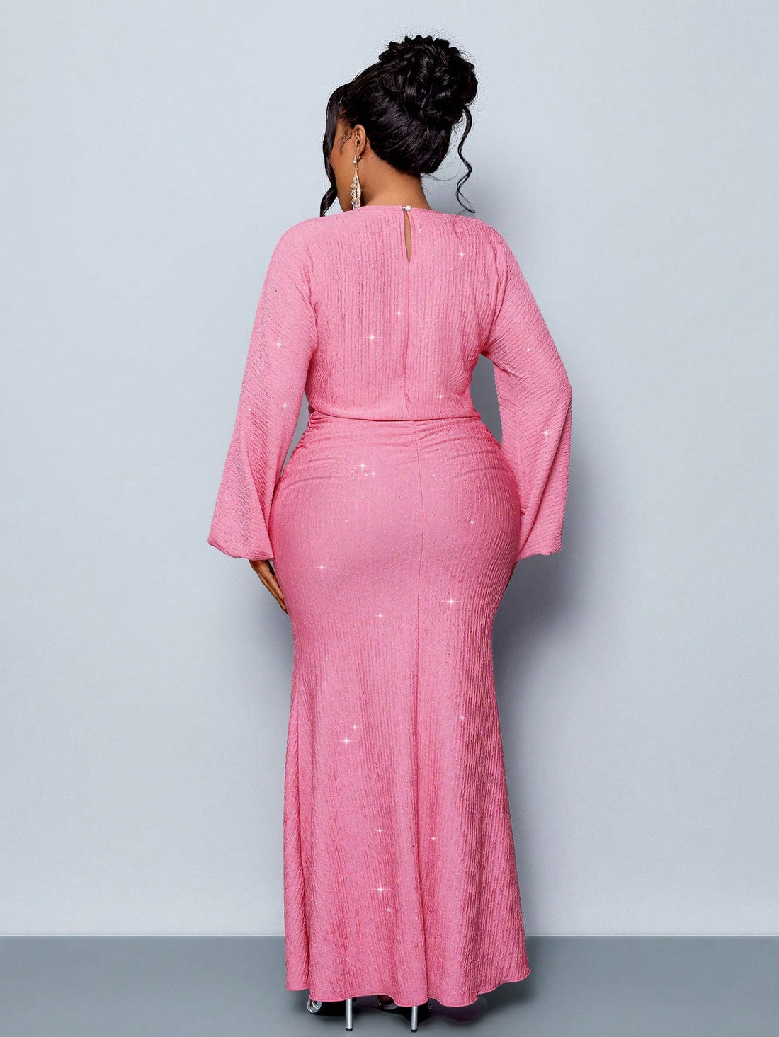 Make a statement at your next big event in this stunning mermaid hem dress designed for curves and confidence. The dramatic lantern sleeves add a touch of whimsy and romance, while the flowing silhouette flatters your figure from bust to knee before gracefully hugging your hips. Perfect for weddings, graduations, or any occasion calling for elegance with personality. This plus-size beauty combines timeless sophistication with playful flair—because looking fabulous should be fun!