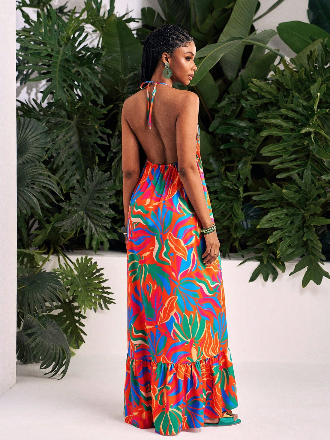 Add some summer flair to your casual outings or beach getaways with our Chic Floral Backless Spaghetti Strap Dress! This dress is both stylish and comfortable with its flowy design and alluring backless feature. Perfect for soaking up the sun and turning heads (but not too seriously). Get yours now!