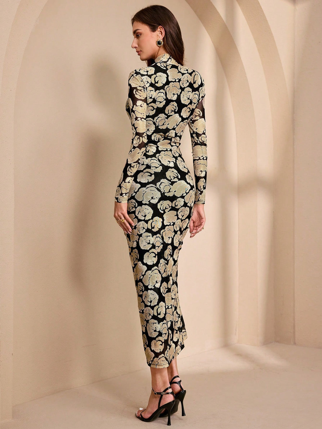 Unleash your inner flower power with this elegant floral maxi dress! With a collared neckline and a playful slit hem, this dress is perfect for any occasion. Bring out your playful side and stand out in style!