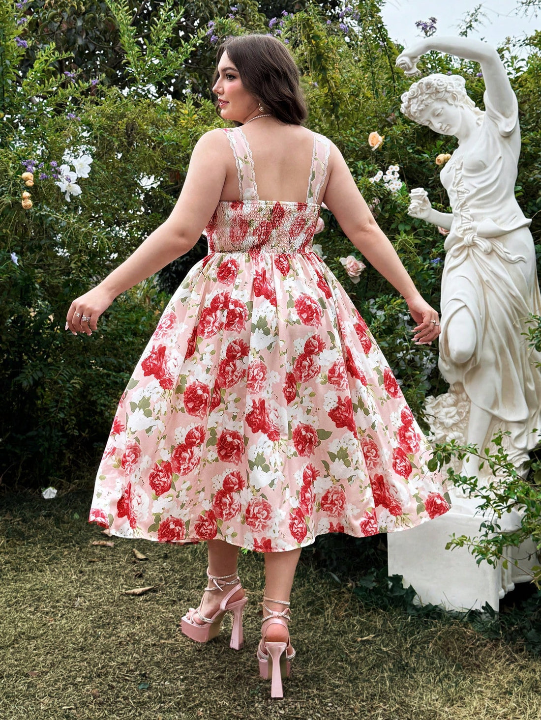 Stay chic and stylish with this Elegant Plus Size Pink Vintage Floral Dress. Perfect for summer holidays, this dress features a sleeveless empire waist design and a timeless vintage floral print. Flatter your curves and make a statement with this must-have addition to your wardrobe.