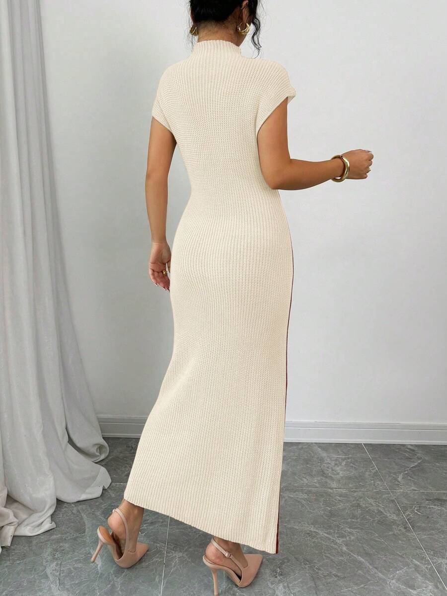 Step into cozy elegance with this chic high-neck sleeveless long sweater dress. Designed to keep you warm without sacrificing style, it’s your go-to for layering this fall and winter. Flowy and flattering, it moves with you while making chilly days feel effortlessly fashionable. Pair it with boots or your favorite jacket and get ready to turn heads wherever you go!