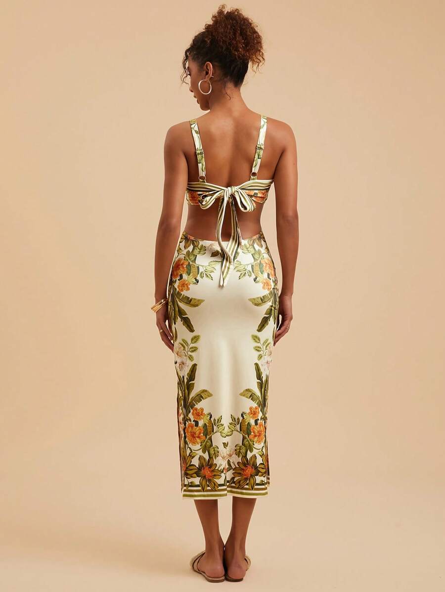 Step into sunny days with this Floral Print Backless Dress designed for carefree summer vibes. Its breezy, open-back style keeps you cool while the lively floral pattern adds a splash of fun to your beach days or vacation strolls. Light and flirty, this dress is your go-to for effortless style under the sun.