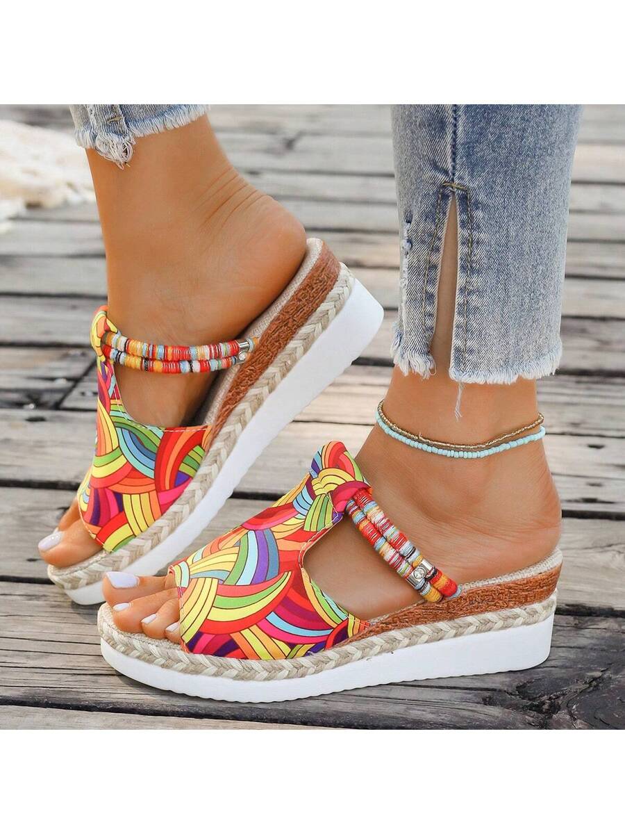 Step into summer fun with these Colorful Graffiti Wedge Sandals! Featuring a vibrant slip-on design and high heel platform, they combine style and comfort effortlessly. The woven details add a unique touch, making them perfect for beach trips or casual outings. Elevate your look with a playful pop of color and easygoing charm.
