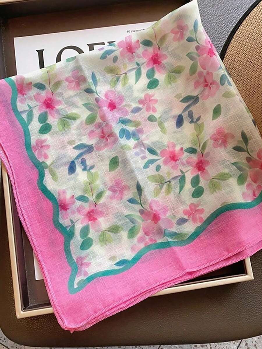 Elevate your seasonal wardrobe with this elegant 60cm silk scarf, featuring a delicate pink ditsy floral pattern that captures the essence of spring and autumn. Crafted from luxurious silk, this versatile accessory drapes beautifully around your neck, shoulders, or hair, adding a touch of sophistication to any outfit. The timeless floral design complements both casual and dressed-up looks, making it an essential piece for transitional weather. Perfect for layering.