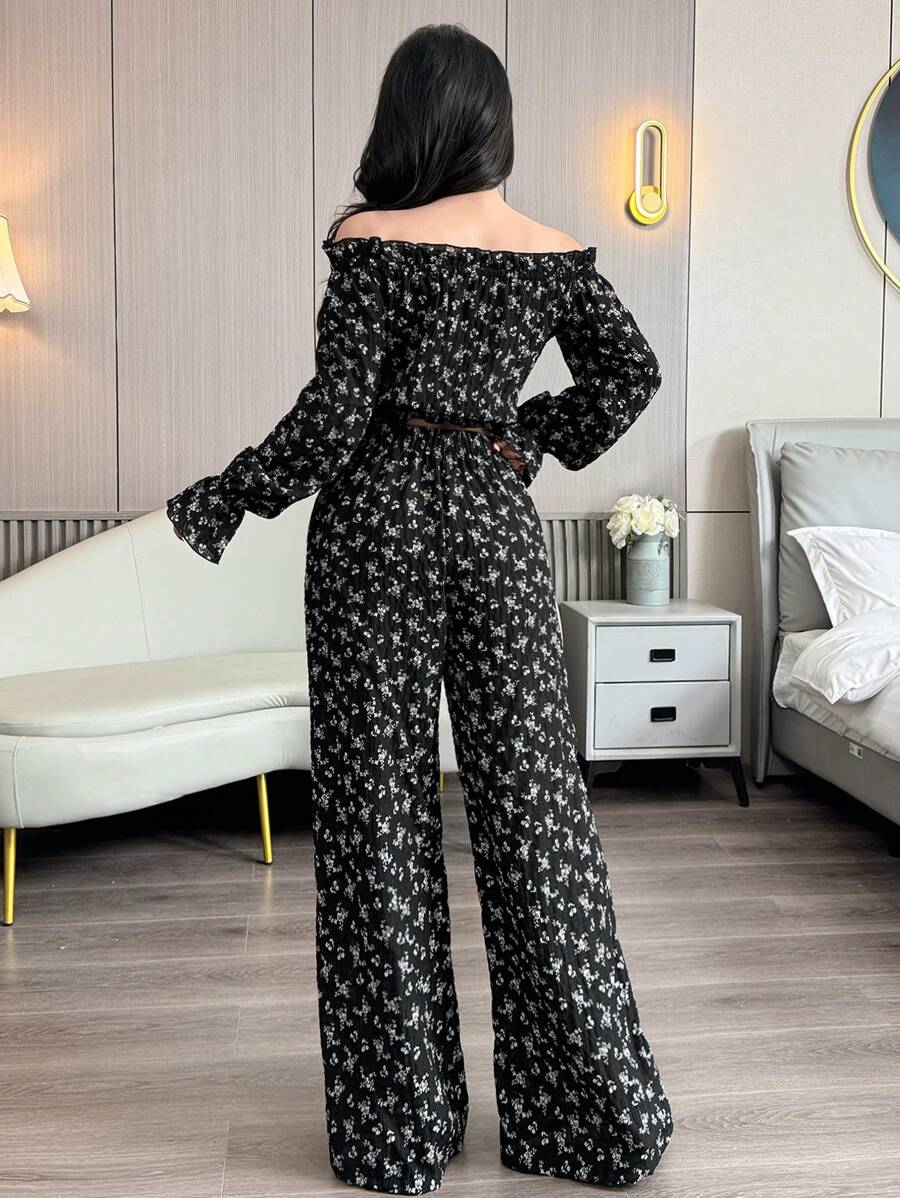 Make a statement with this effortless two-piece set that's perfect for turning heads. The off-shoulder cropped top flaunts a flirty silhouette that pairs beautifully with high-waisted wide-leg pants for a balanced, fashion-forward look. Whether you're hitting the town or keeping it casual, this combo delivers instant style without the fuss. Comfortable, versatile, and undeniably chic—your new go-to outfit awaits.