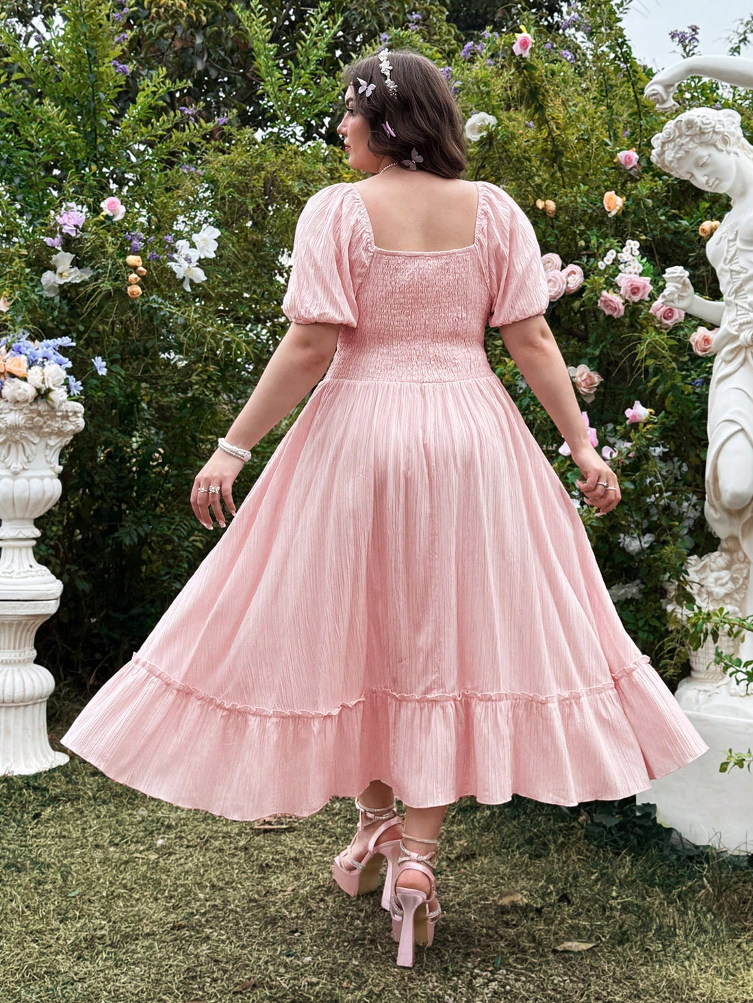 Get ready to turn heads in this Elegant Plus Size Pink Short Sleeve Waisted Vintage Dress! With its flattering waistline and charming pink color, this dress is perfect for romantic getaways and everyday chic style. You'll feel confident, comfortable, and stylish all at once.