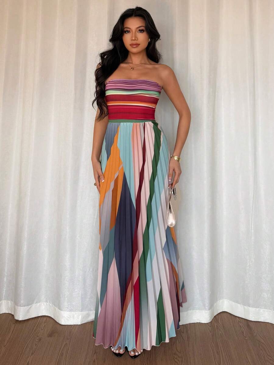 Turn heads with this playful strapless dress featuring a ruched waist that flatters your silhouette. Perfect for special occasions, it combines elegance with a fun, flirty vibe to keep you dancing all night long.