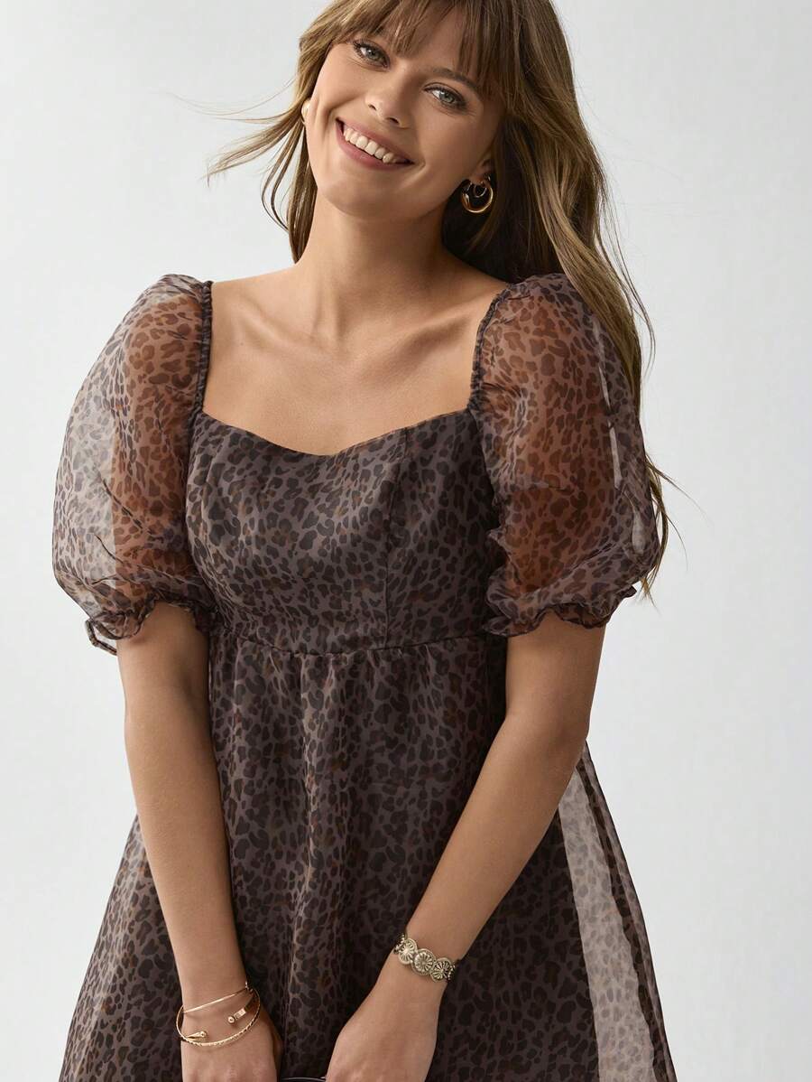 Step into summer with this playful leopard print mini dress featuring charming puff sleeves. Its lightweight fabric and flirty silhouette make it ideal for sunny days and western resort adventures. Effortlessly stylish, this dress adds a fun, bold touch to your warm-weather wardrobe.