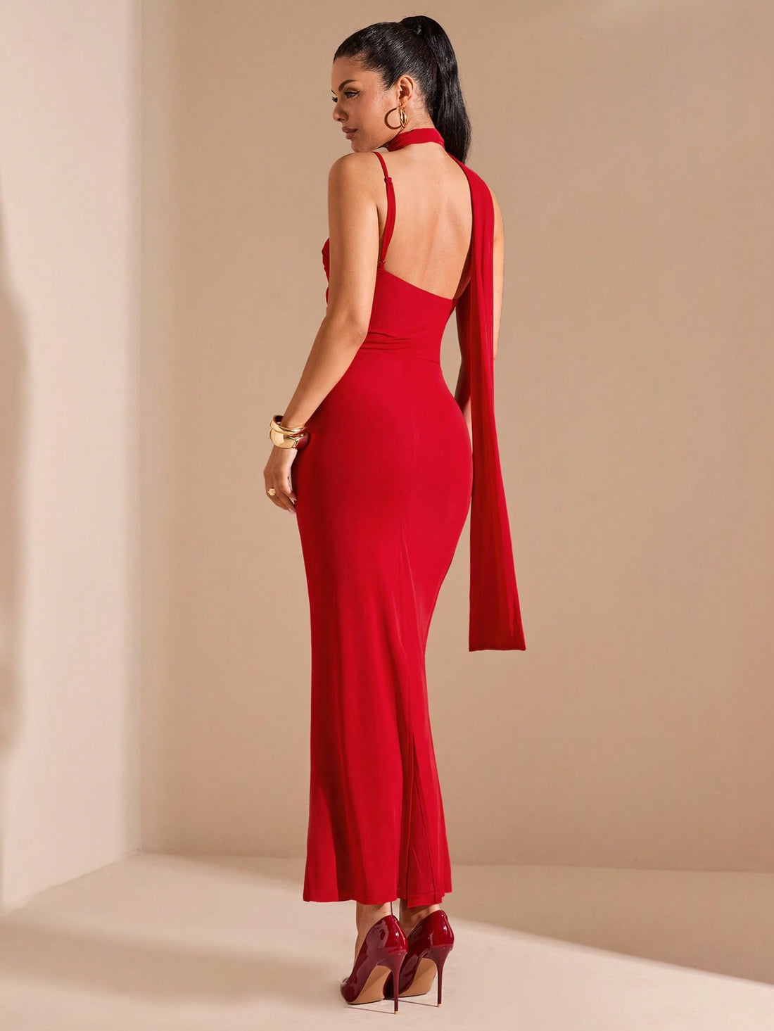 Elevate your fashion game with our chic solid color dress! Featuring a trendy ribbon collar, backless design, and spaghetti straps, this fitted dress exudes effortless elegance. Perfect for any occasion, it's a must-have addition to your wardrobe! (Dress up with ease and elegance in our backless, spaghetti strap dress with a cute ribbon collar.)