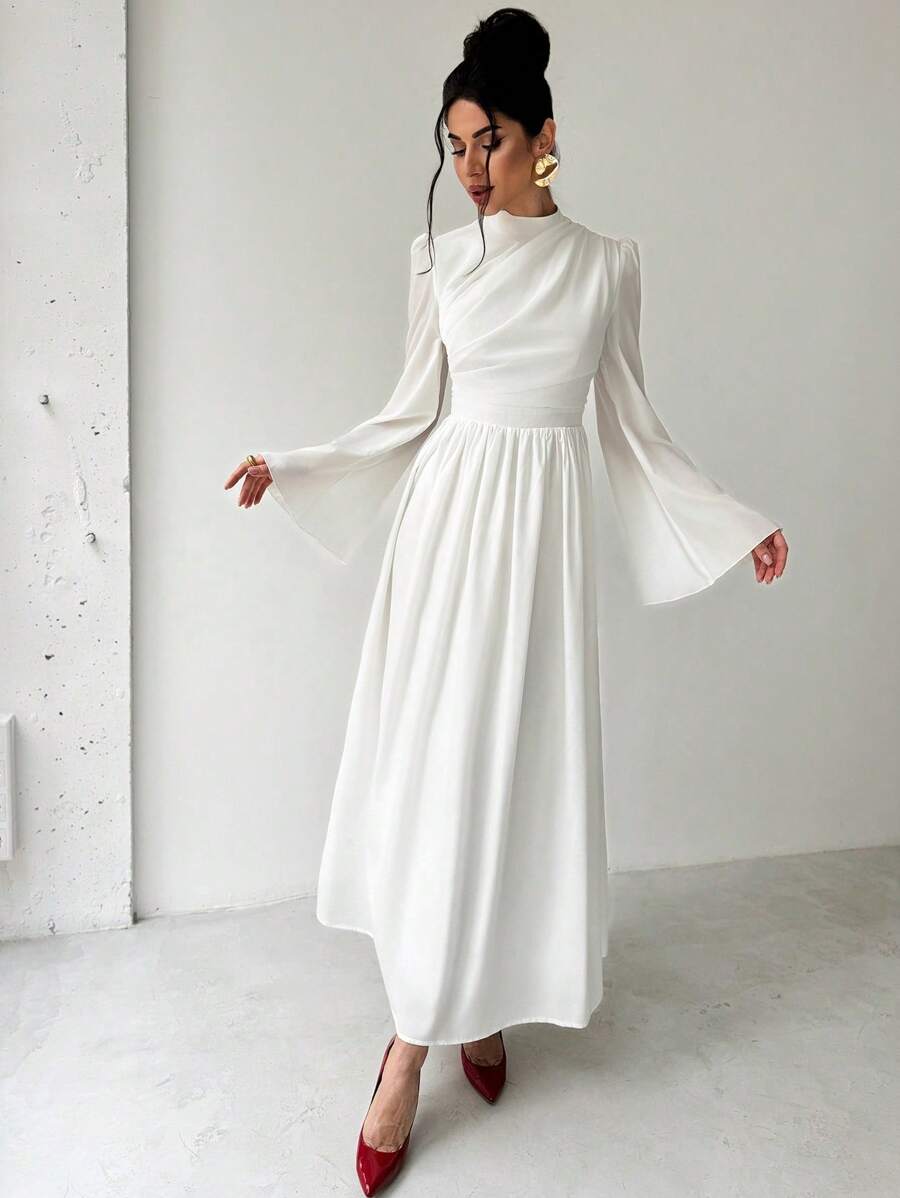 Elevate your wardrobe with this stunning plus-size white dress that's as versatile as you are! Whether you're crushing it at the office, turning heads at a party, or making a memorable impression on a date, this elegant piece has you covered. The crisp white hue flatters every complexion while the thoughtfully designed silhouette celebrates your curves with confidence and grace. Dress it up with heels and statement jewelry or keep it casual with sneakers and a denim jacket—this wardrobe essential adapts to 