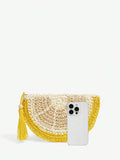 Textured detail view of playful straw clutch bag with tassel accent