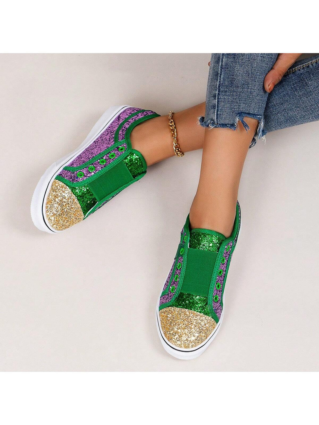 Step into sparkle with these eye-catching colorblock sequin canvas slip-on sneakers! Perfect for adding a playful pop to any outfit, these dazzling kicks combine comfort and glamour effortlessly. Slide them on and transform even your most casual looks into statement-making ensembles. Who said comfort can't be fabulous?