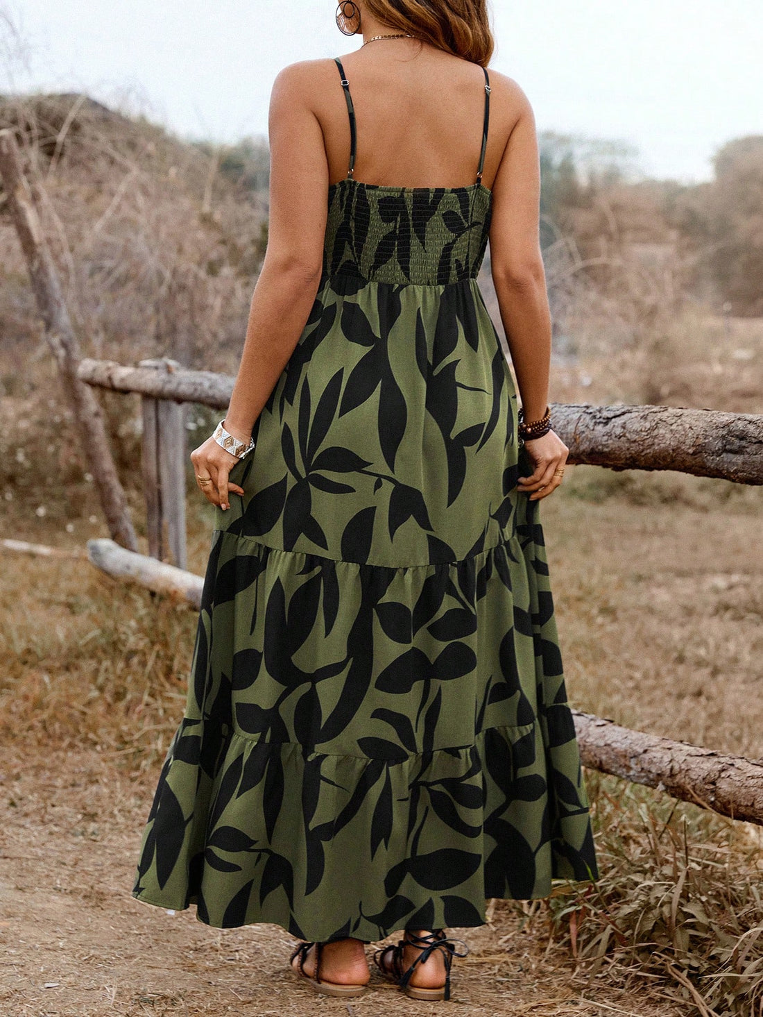 Embrace your inner bohemian goddess with this playful plus-size sleeveless dress! Adorned with eye-catching floral patterns and flirty layered ruffles, it's the perfect vacation companion. Float from beach to bistro with effortless style—this breezy number keeps you cool while turning heads during those sun-soaked spring and summer adventures!