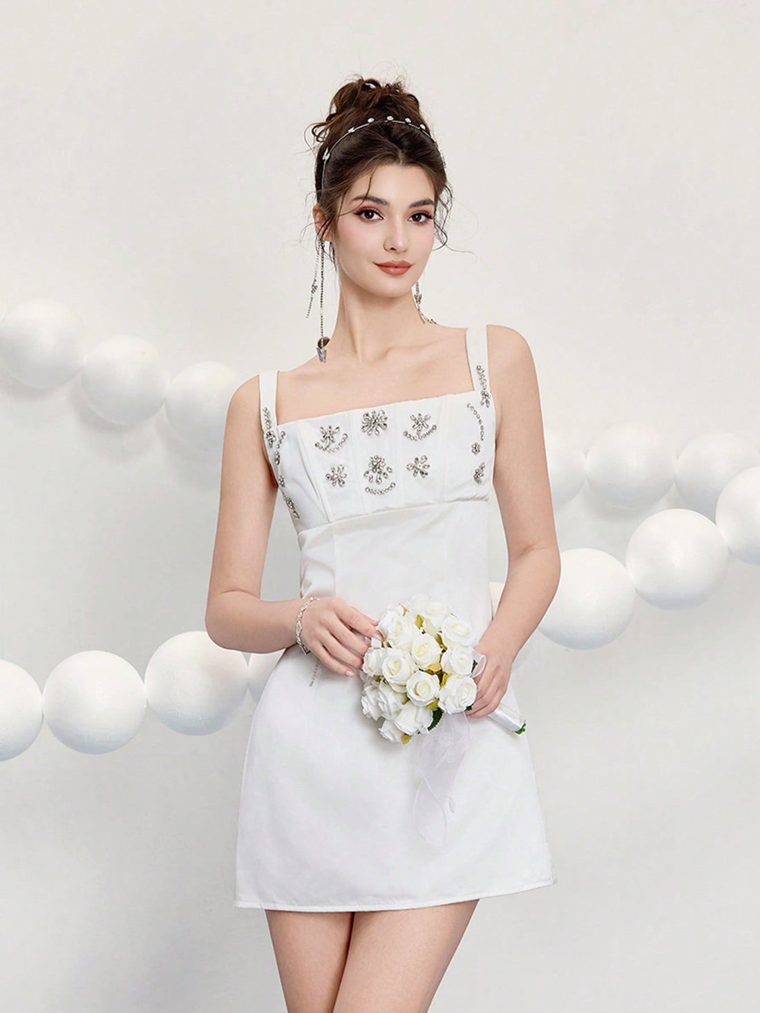Slip into sophistication with this stunning beaded mini cocktail dress—your secret weapon for turning heads at weddings and special events. Intricate beadwork catches the light beautifully, creating an eye-catching shimmer that demands attention. The flattering mini silhouette strikes the perfect balance between chic and flirty, while the elegant design ensures you'll feel confident and fabulous from cocktail hour through the dance floor. Whether you're celebrating a milestone or attending an upscale gather